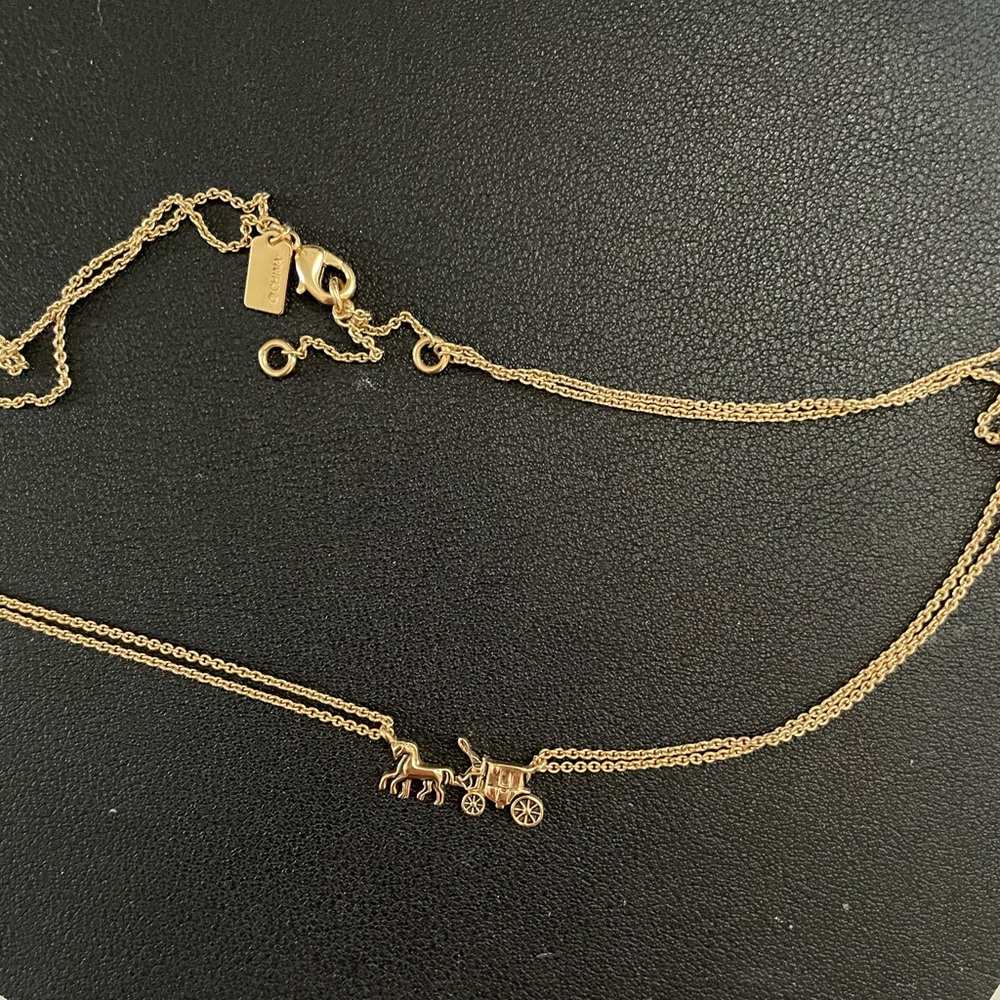 Coach carriage gold necklace